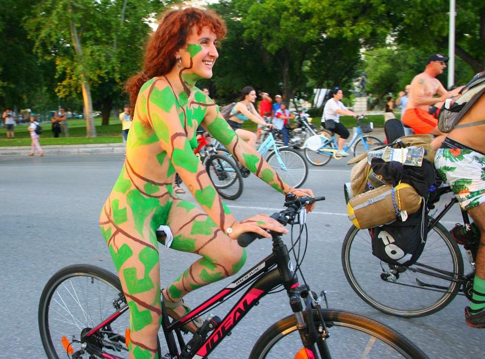 Naked bike ride woman