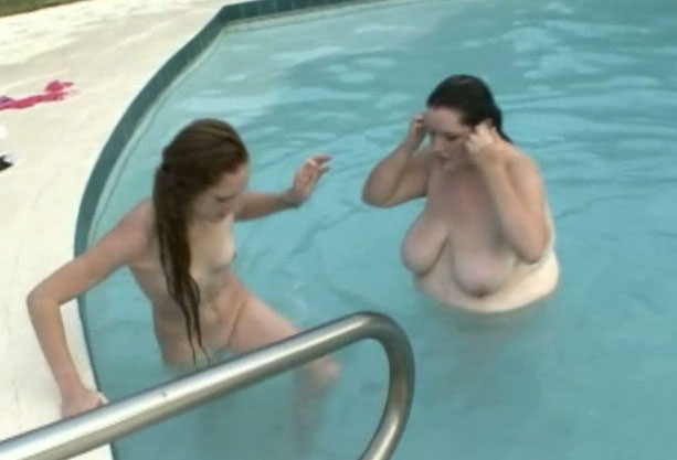 Naked girls having fun at pool
