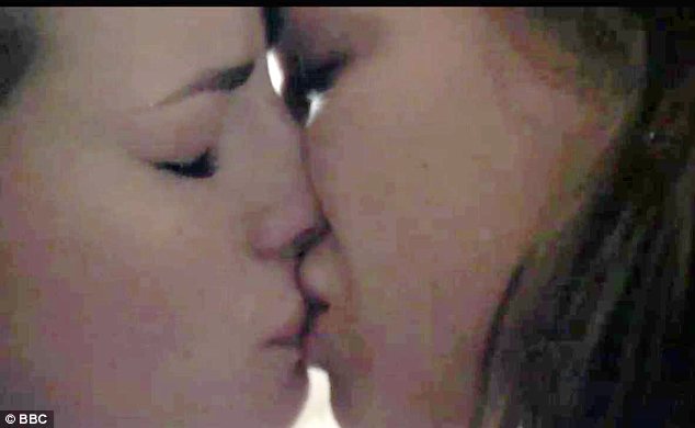 Lesbian teacher and student kissing