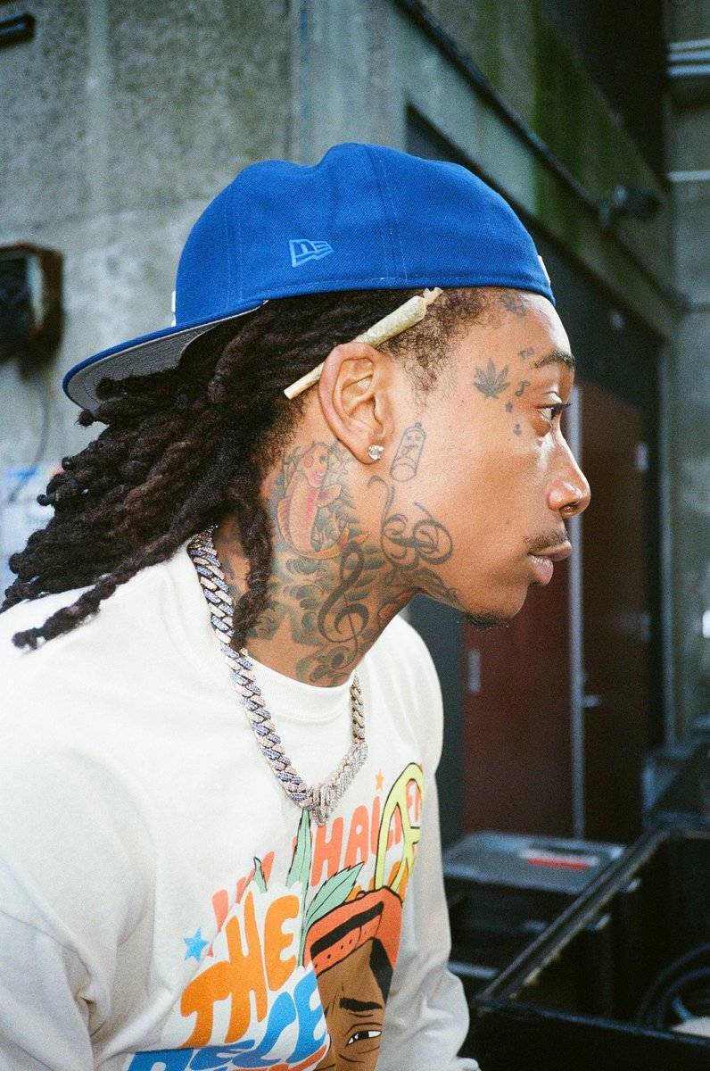 Wiz khalifa with dreads and black hat