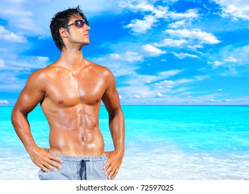 Hot ethnic boys at beach