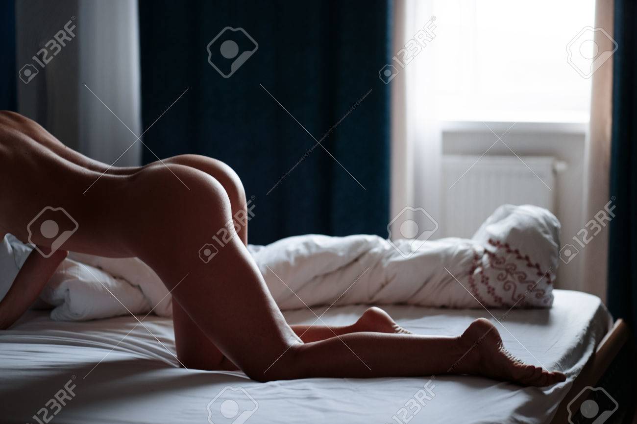 Beautiful woman nude bed