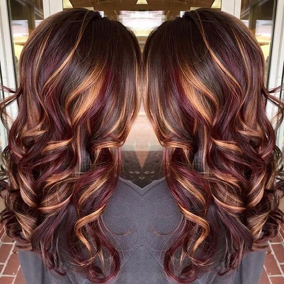Dark brown hair with red highlights