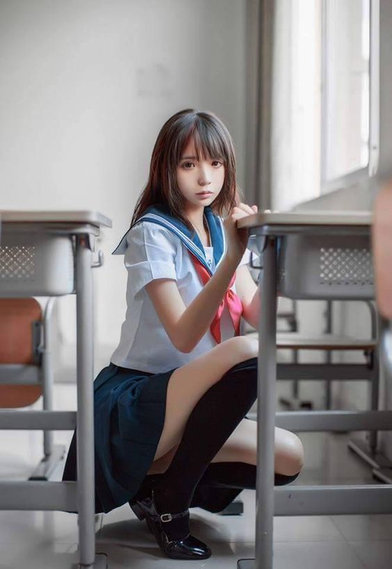 Japanese girls sitting on desk
