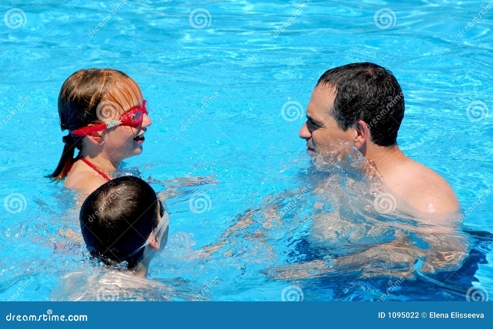 Nudist families boys swimming