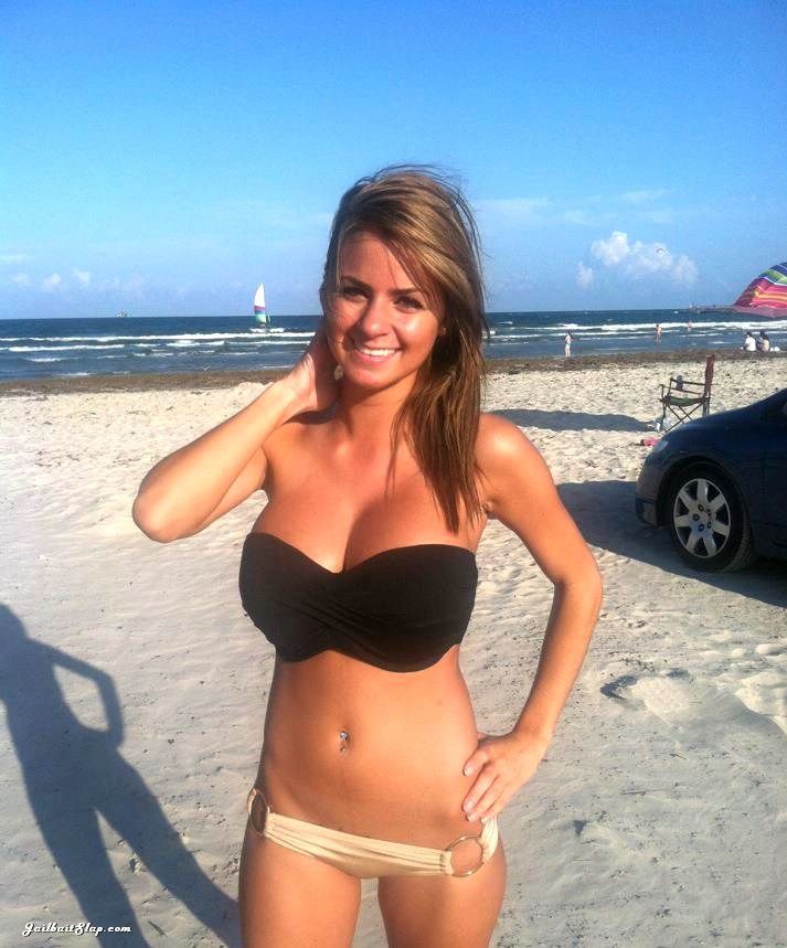 Busty teen at beach