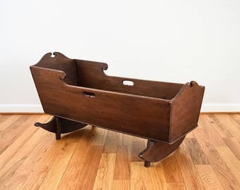Antique victorian swinging bassinet