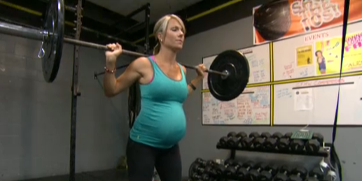 Pregnant mom lifting weights